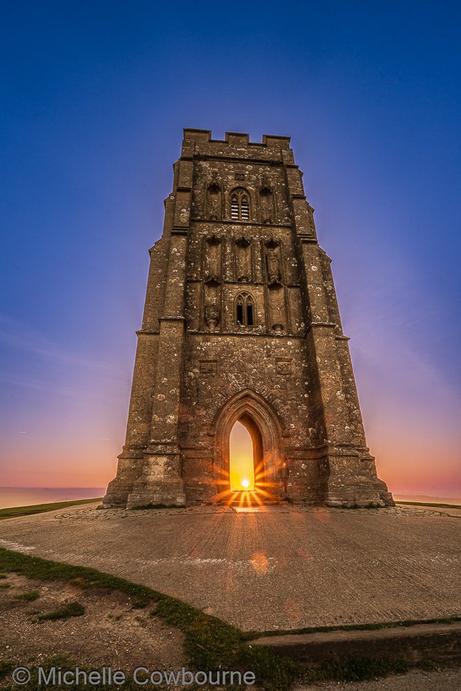 Glastomichelle's tweet photo. The Key to Avalon. This morning's sunrise on Glastonbury Tor. A bit windy up there and very cold hence nobody else around. https://t.co/cq7Wwf9Bkr