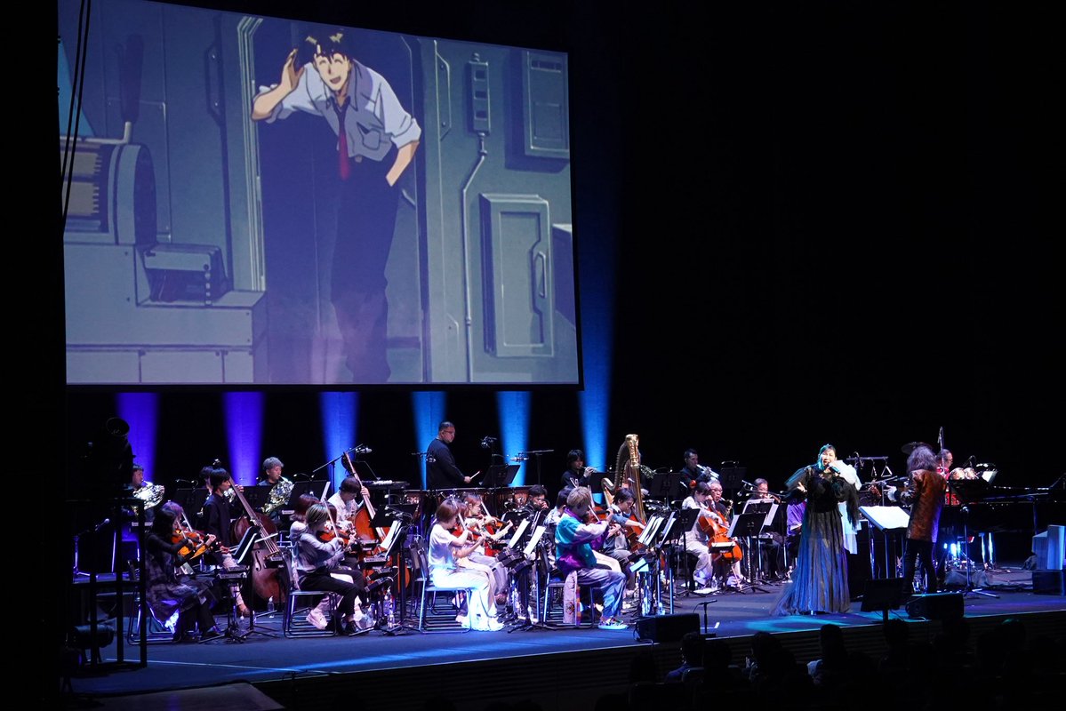 evangelion_co's tweet image. 『エヴァンゲリオン』 シリーズ初、映像とともに楽しめるコンサート「BACK TO NEON GENESIS」東京公演が4/19に開催されました！

音楽でたどる30年の軌跡、
鷺巣詩郎さん率いるオーケストラ×高橋洋子さんによる魂のソロ歌唱に加えて
本編名シーン映像と共に至高の旋律で蘇ったフィルムコンサート。