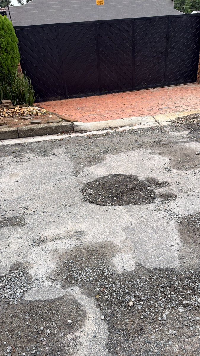 CarrollClinton's tweet photo. @MyJRA Is this the way potholes are now fixed? These were repaired yesterday in Hardekool street in Sundowner. Not 24hrs later they falling apart. https://t.co/scZnEhl4Tj