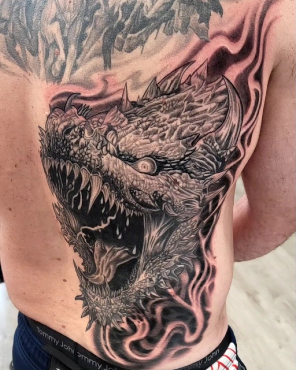 Amazing dragon tattoo by Ruben Carrero at 12 oz. Studios Deptford, NJ. #12ozstudios #tattoos