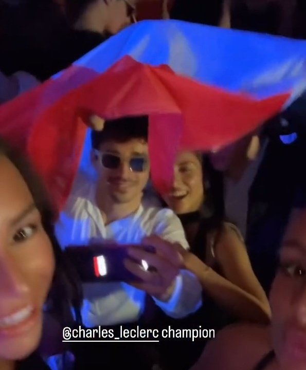 charles taking selfies with the monaco flag on top of his head after winning monaco 😭❤️