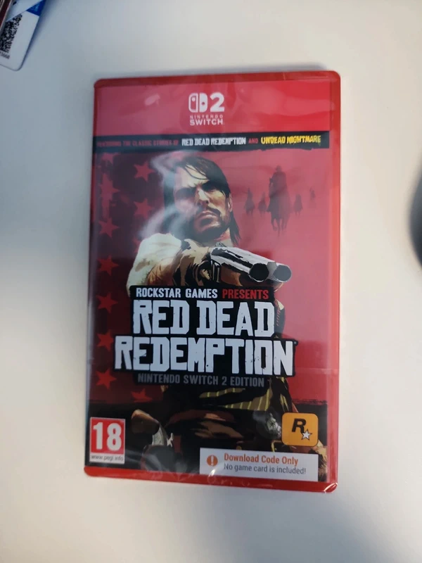 Imagine making a gazillion of moneys through GTA Online each year, yet being too cheap to do not a NSW2 Edition, not even a GKC, but going Code-in-a-friggin-box for this.

(Picture from an early copy of RDR Switch 2 sold on Vinted in England, according to rockstarintel(dot)com)