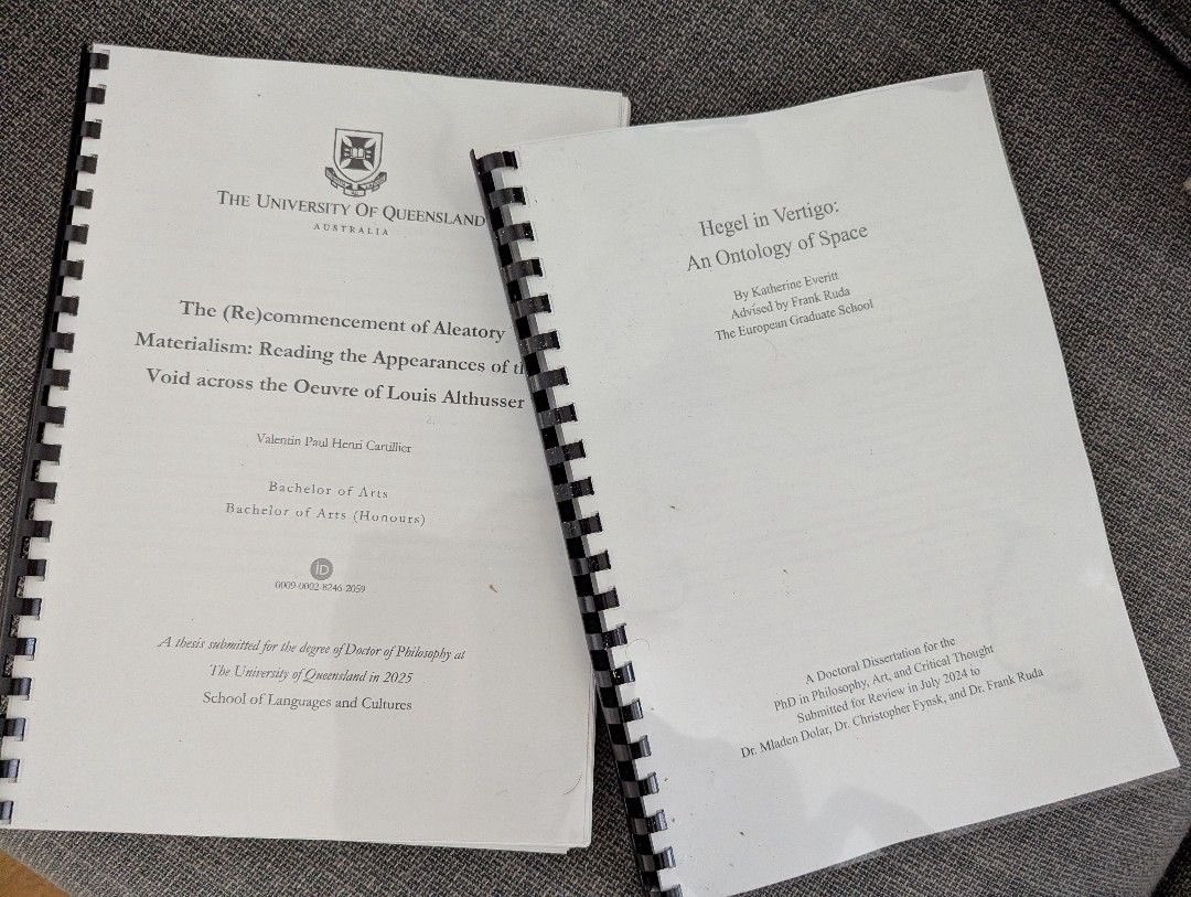 He sent me a photo of our two dissertations “kissing”