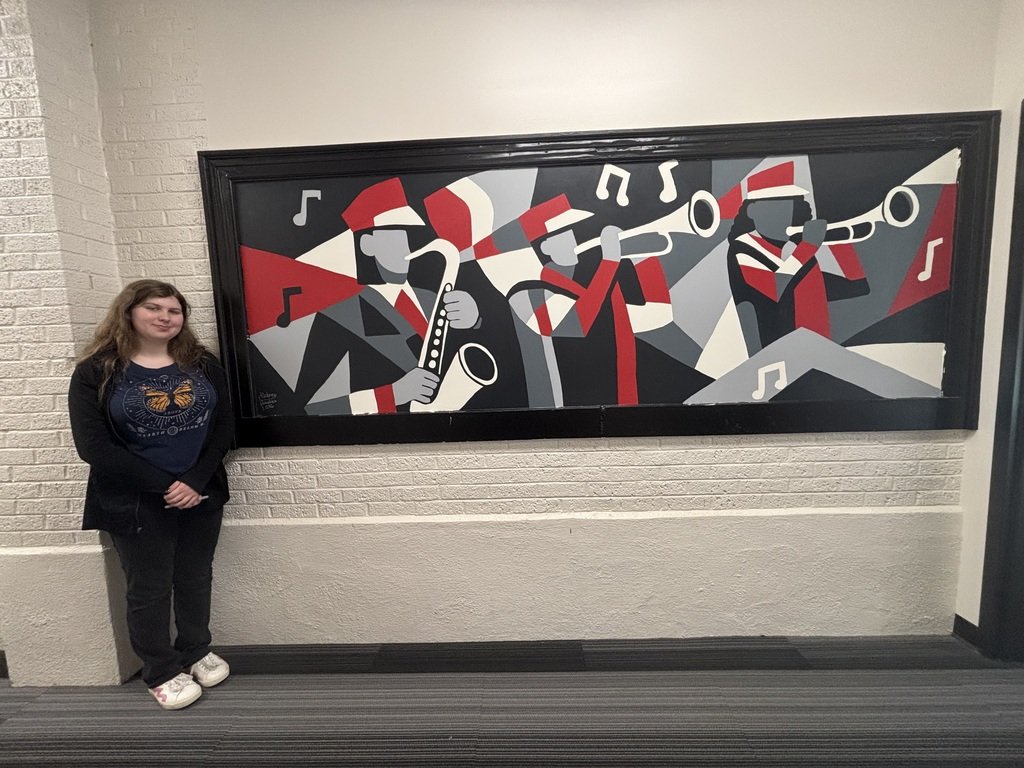 usd358's tweet photo. Aubrey Justice and Cecily Shull, senior art students, have finally completed the new murals in the band hallway. We are so proud of these young ladies' hard work and dedication to their artistic endeavors. https://t.co/LPmFPsit81