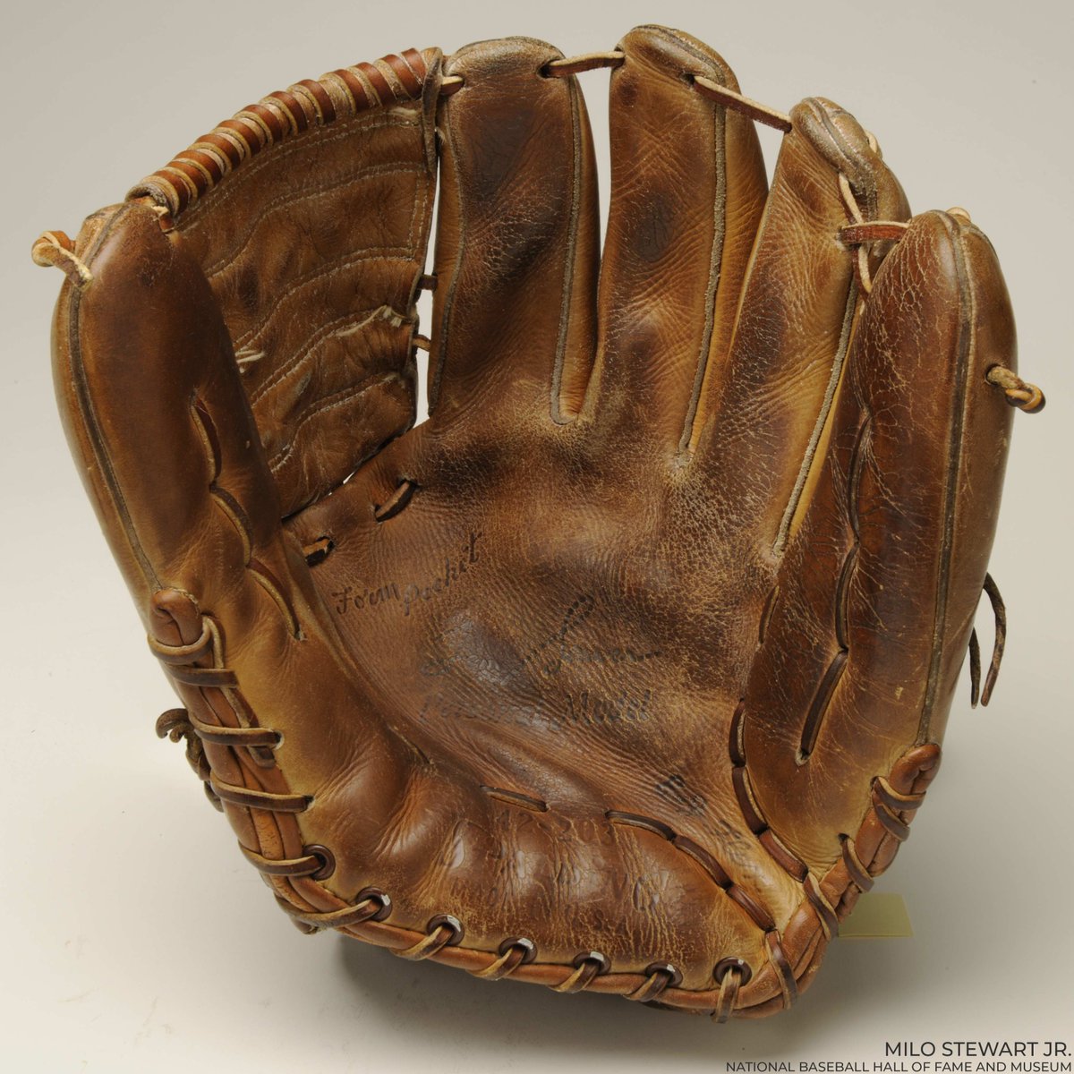 baseballhall's tweet photo. #OTD in 1970, Tom Seaver wore this glove on his left hand and wore out Padres batters with his right, striking out 19 and whiffing a record 10 in a row to end his gem. https://t.co/s47UMGxvY7 https://t.co/R7RcFGWUxx