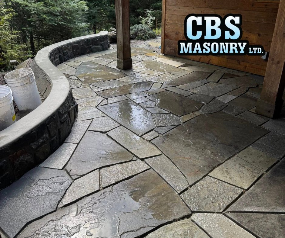 CBSMasonryltd's tweet photo. Showcasing CBS Masonry’s craftsmanship in East Sooke: walkway, patio, and rock walls designed with Pennsylvania blue stone, San Juan blue stone, silver mica slate. Each stone is precisely dressed and will be set with tight mortar joints for a seamless, durable finish. #CBSMasonry https://t.co/UTscIlCP2Y