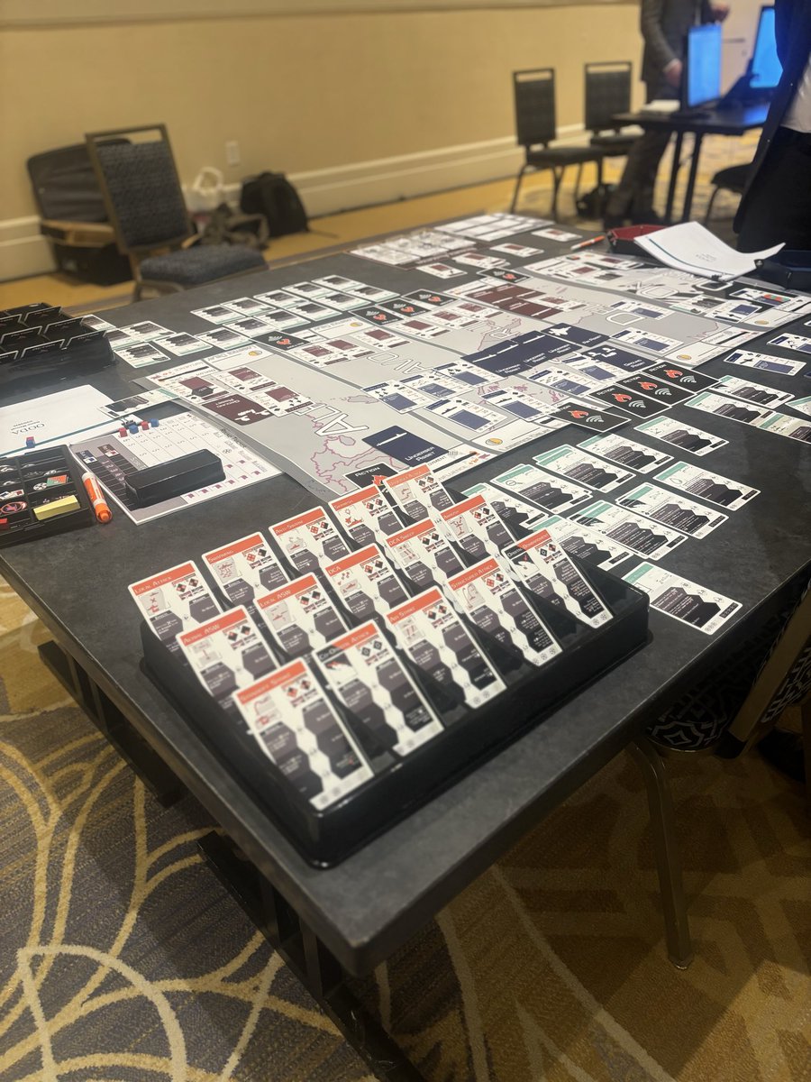 SeaAirSpace's tweet photo. Gaming to Win w/ @CMS_Washington features both physical and digital game environments, letting attendees experience how modern wargaming is shaping maritime strategy and how decisions are tested before they reach the fleet. https://t.co/C2hr4kPdt5