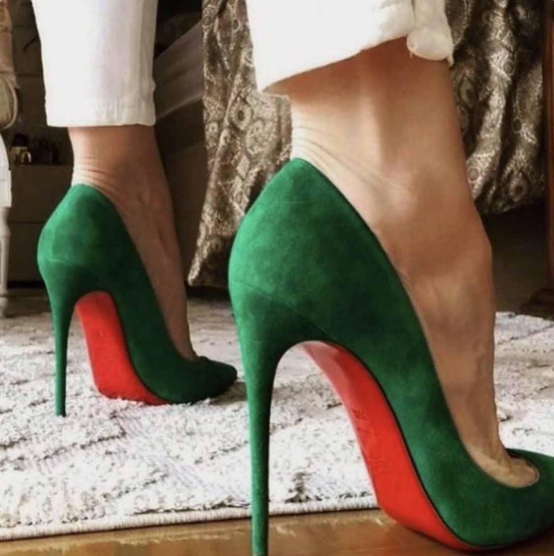 Enjoy the red soles…