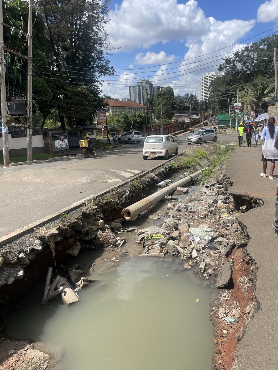 tkmaru's tweet photo. @KenyaPower_Care @KenyaPower this is Bishop Rd in Upper Hill. Your crews removed the cables but left the poles blocking the culverts as debris. This is shameful. Kindly collect your poles and reuse elsewhere. https://t.co/y18JwDtEnI