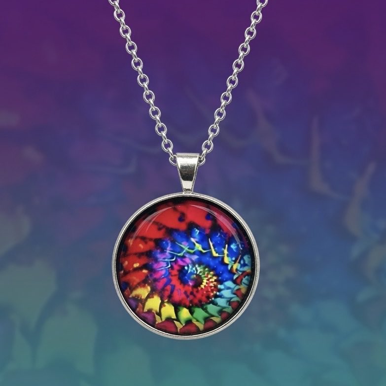 ZaverDesigns's tweet photo. Bold spiral rainbow pendant catches light and attention! 
Link: https://t.co/H3Jh5sACsZ

#rainbowjewelry #statementnecklace #colorfulstyle #giftforher #etsyfinds #bohostyle https://t.co/SRMZ1cittF