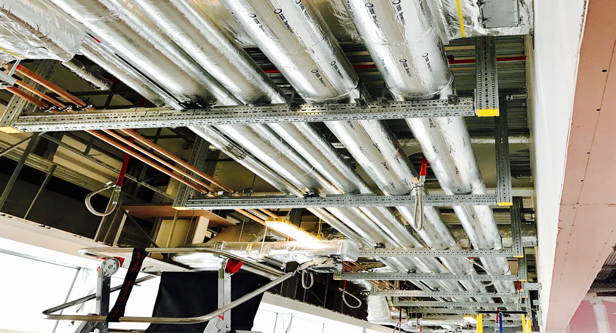 Prefabricated plumbing racks are pre-assembled offsite and delivered to high-rise projects like the one in Leeds for plug-and-play installation. These modules often combine multiple services including water, drainage, and electrical containment into a single steel frame.
