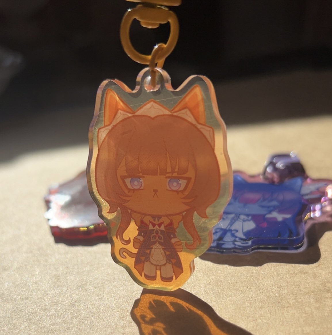 florafication's tweet photo. my arlecchino, columbina, and sandrone cat charms are here &amp; available on my etsy!! 

i got a very low quantity of each design for this first round, just to see how they do✨ 

which one’s your favourite? 💛❤️🩵 https://t.co/2Xj5LysEOa
