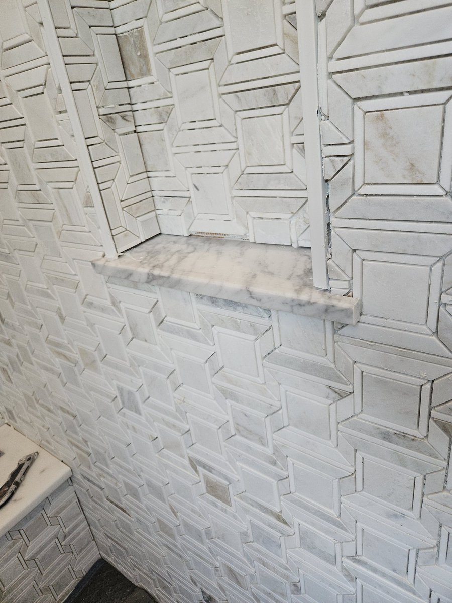 Cut a bunch of marble for these windows and a wall pocket