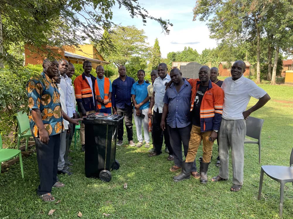 RRM_Ug's tweet photo. This #EarthDay2026, we chose impact. 

From Mbaale Trading Center in Mayuge District to Rural Orphans and Widows Aids Network, in Bigiri District — The RRM team rolled up sleeves to clean up, donated waste bins, and talked waste management with the project area communities. https://t.co/w5Vocj7cXg