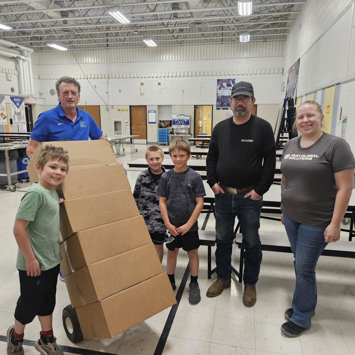 FASTequip's tweet photo. Packing for the United Way Backpack Attack program is fun, but delivering the food is an especially rewarding activity. Especially when we see the smiles! https://t.co/yzLrXyZeXt