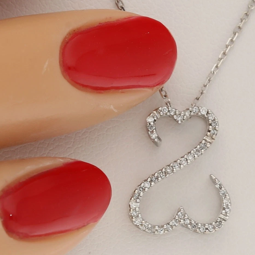 EmpirePawn's tweet image. A perfect Mother’s Day gift! This 14K white gold double heart pendant with .15CT natural diamonds is just $279.18—meaningful and beautifully priced.

#MothersDay #DiamondPendant #NaturalDiamonds
ebay.com/itm/1275053360…