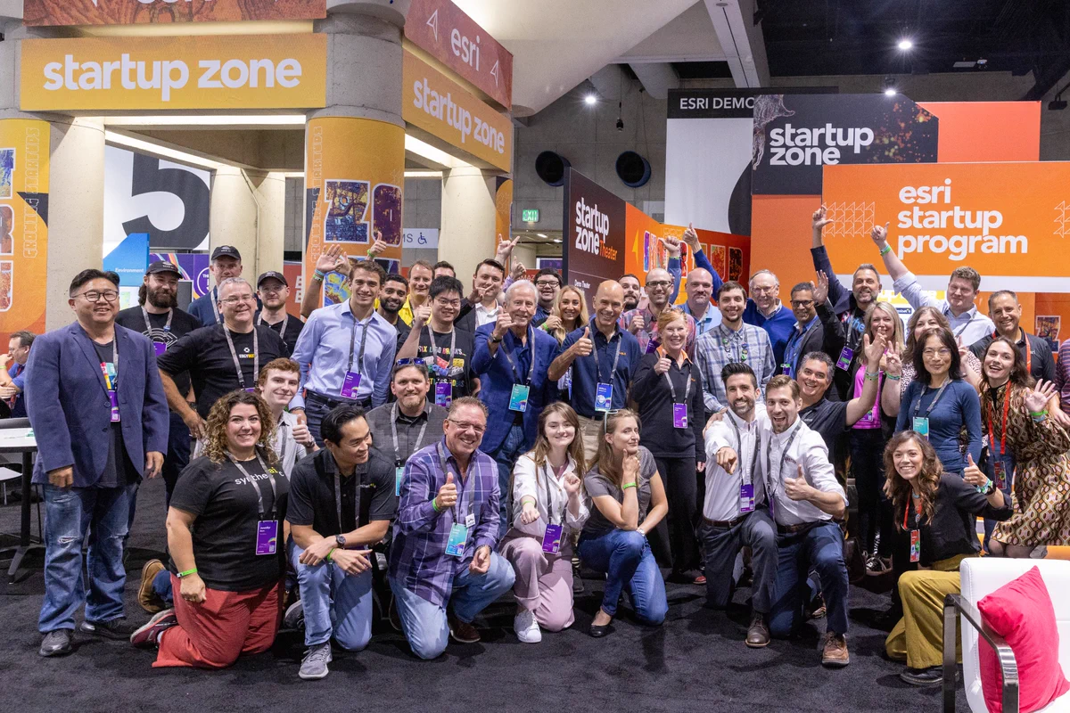 Esri Startup Program group photo within the Startup Zone at Esri User Conference (UC)