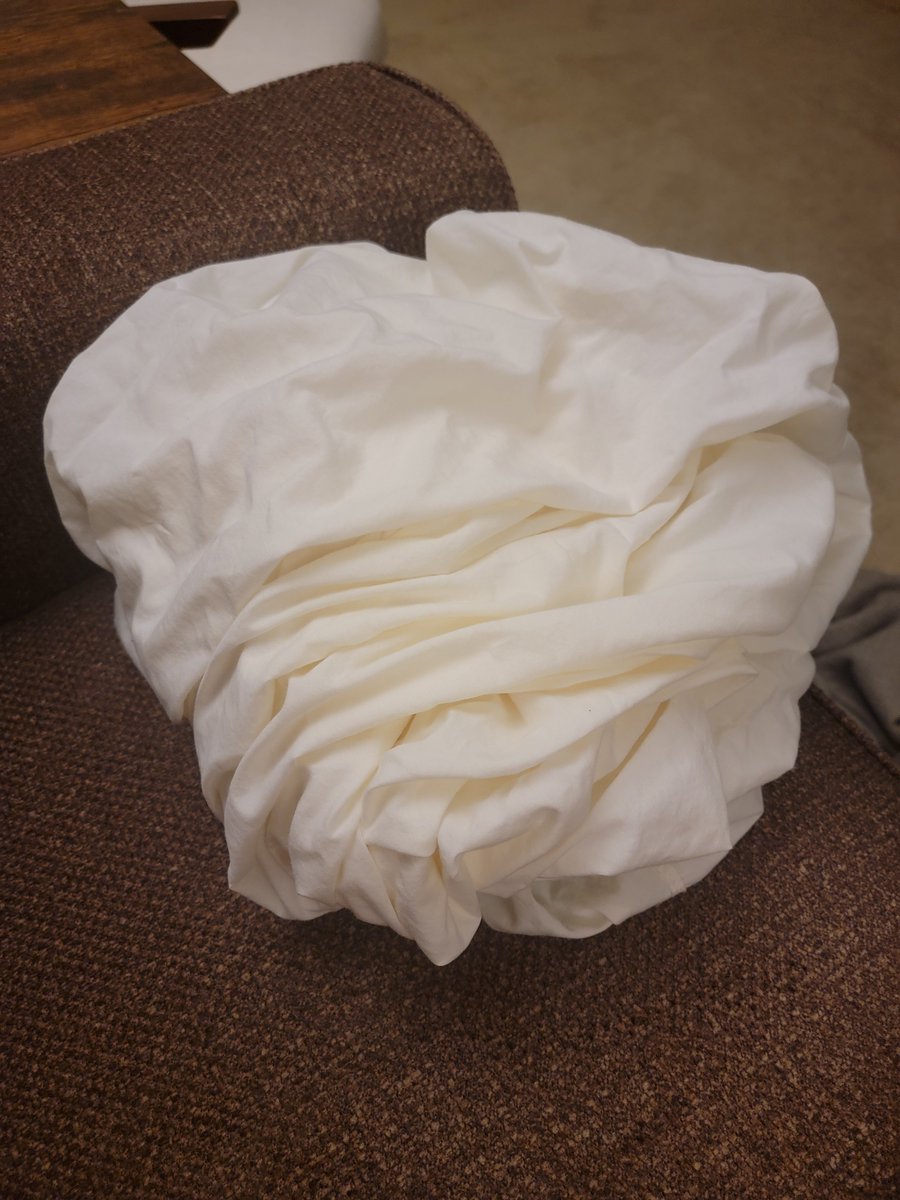 How real men fold fitted sheets. Follow for more life hacks.