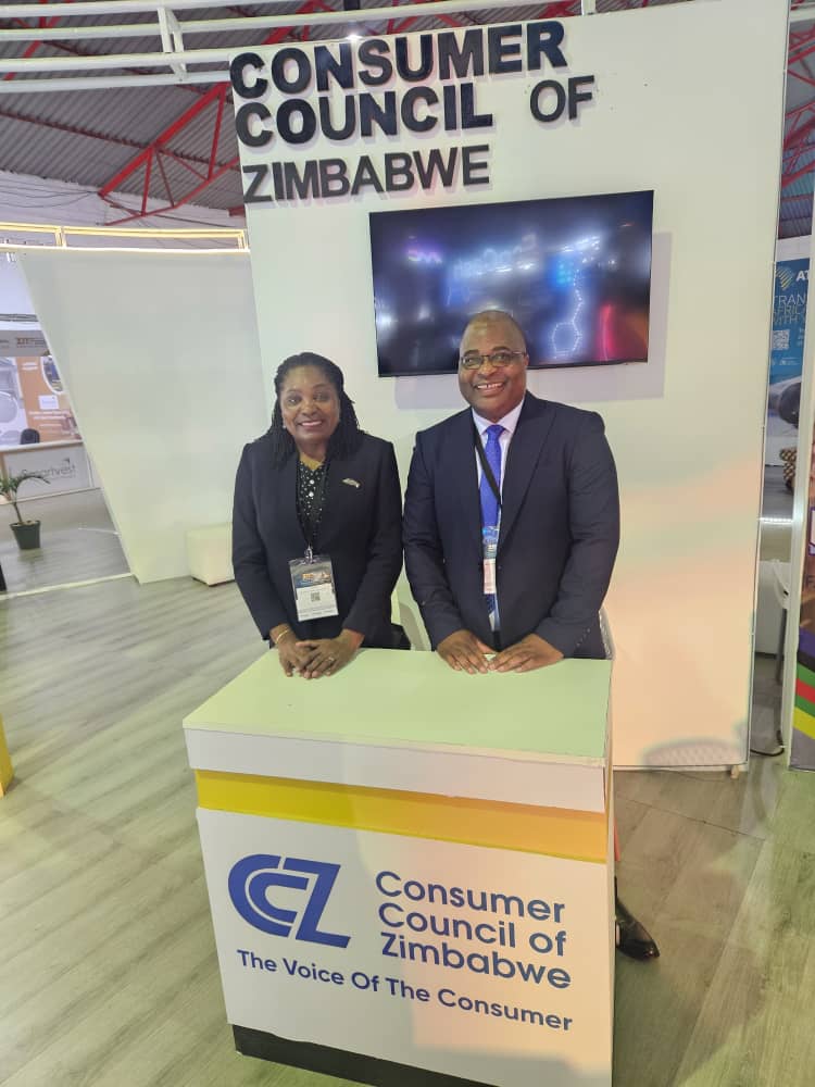 CCZ_263's tweet image. #Day 4 ZITF 2026: Chief  Executive Officer, Mrs Rosemary Mpofu posing for a photo with Staff and Consumers who  visited our stand.