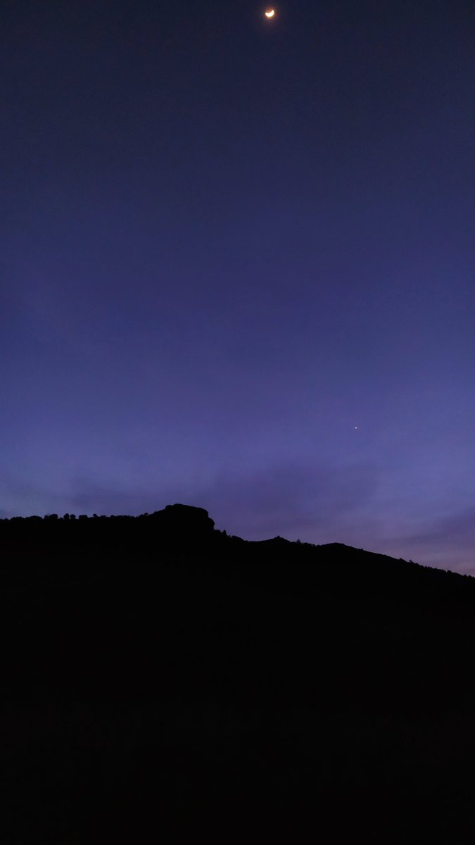 ArtIsmailNFT's tweet photo. As the forest sinks into its deep shadows, the crescent moon whispers the secrets of light to the sky. A moment of reflection captured by my eye, before my heart . https://t.co/yP09Gj5ItE