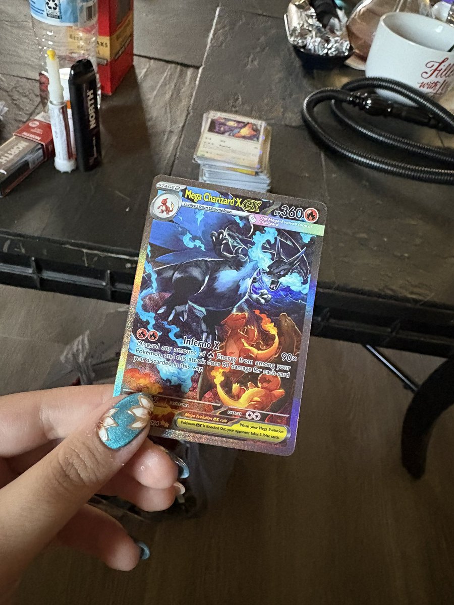if i had a nickel for every time i pulled the phantasmal flames charizard, id have two nickels. which isnt a lot, but its weird that it happened twice