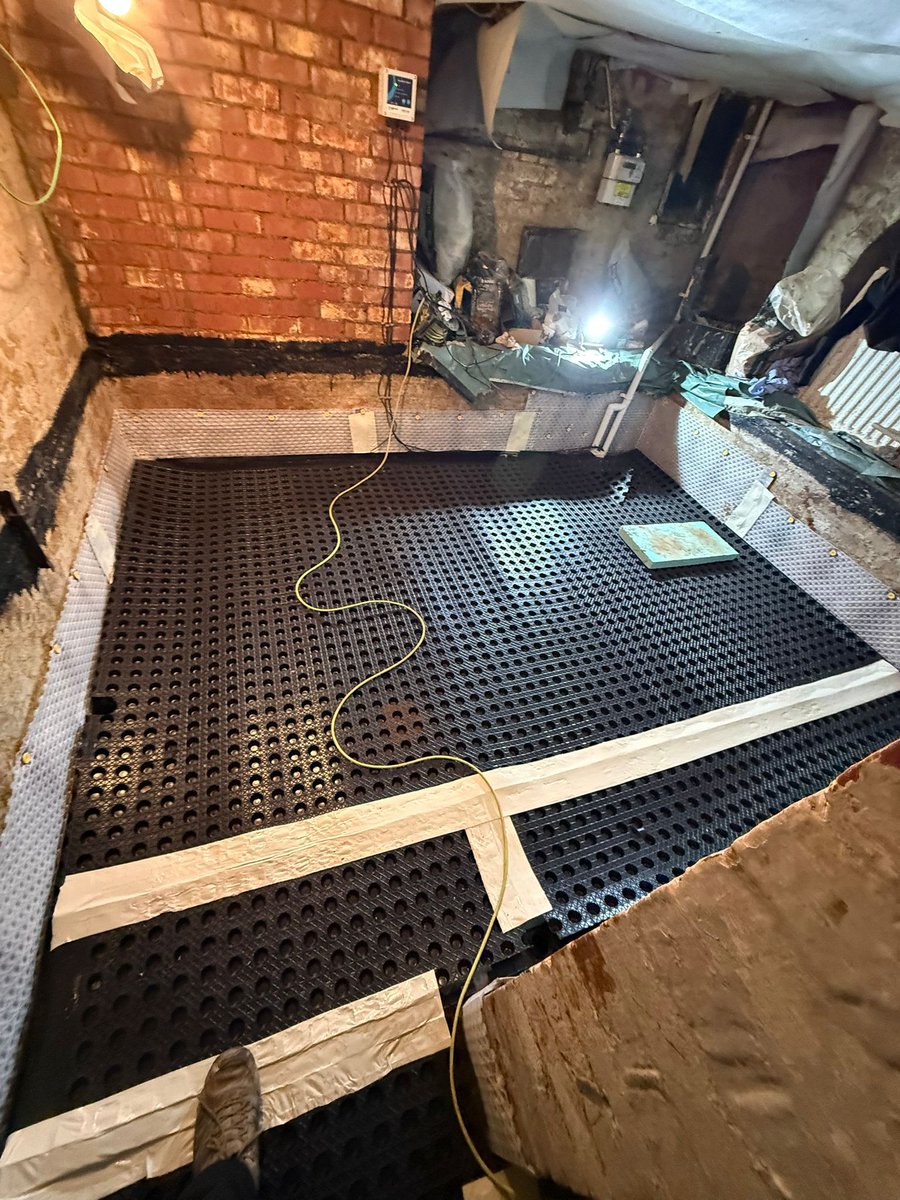 DampSolutions1's tweet photo. Basement waterproofing project using a full Type C system with membrane installation, pump station, backup pump and alarm. A new insulated raised floor was added, creating a dry, stable space suitable for long‑term storage and ongoing protection. https://t.co/bDHPIPjLvJ