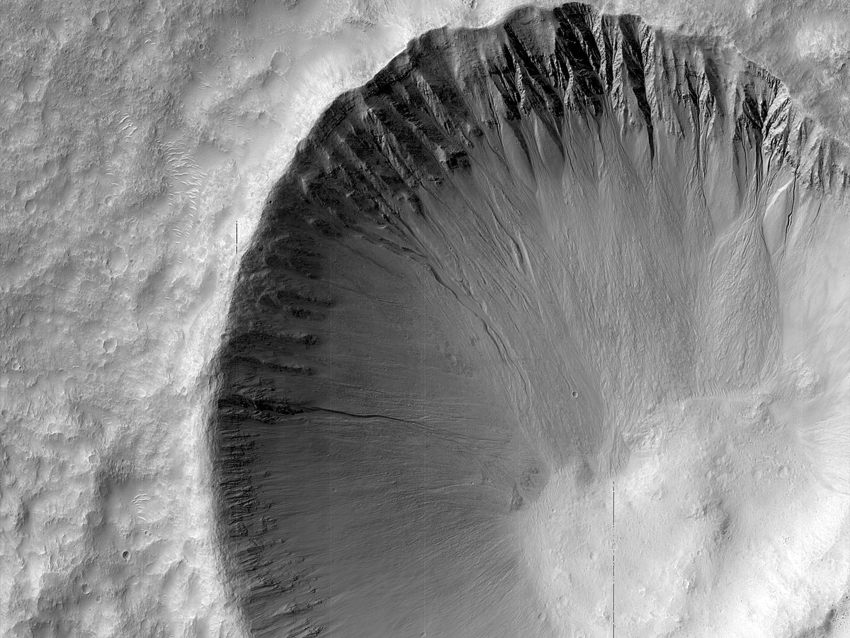 HiRISE's tweet image. HiPOD: Gullies with Extensive Debris Aprons

These gullies in Terra Sirenum have very extensive and detailed debris aprons. This image will be useful to understand more about gully formation processes. 

uahirise.org/hipod/ESP_0769…
NASA/JPL-Caltech/University of Arizona
#Mars #NASA