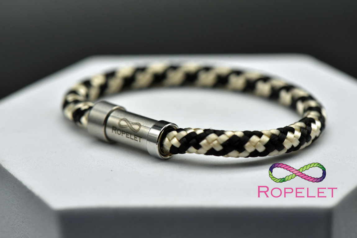 Ropelet's tweet image. Our UK made Ropelets are stylish, affordable and made to your choices. This black and gold one is just one from our wide ranges at ropelet.co.uk . Order yours today and treat your wrist #ropelet #bracelet #fashion #style