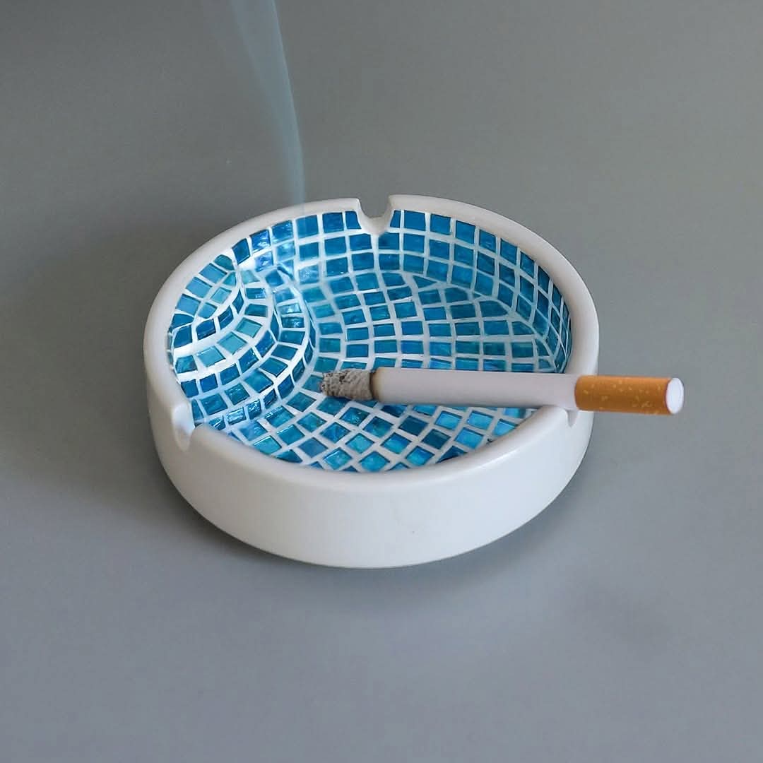 Ceramic ashtrays designed by artist Gab Bois, inspired by swimming pool tiling.