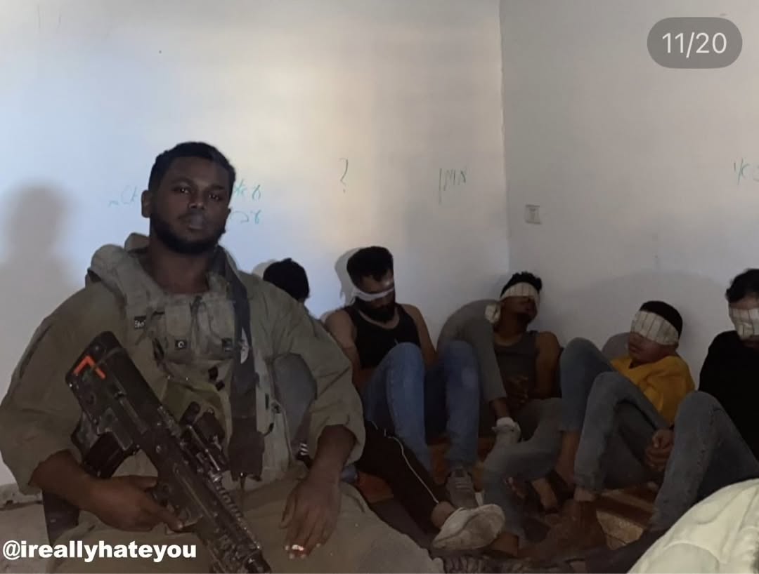 An Israeli occupation soldier shared an Instagram story showing himself with a weapon beside several blindfolded and handcuffed Palestinian detainees.