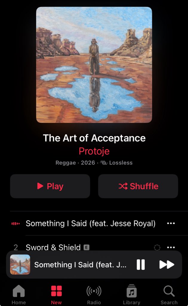 iamenocksavage's tweet photo. Simple Acceptance  

Red desert sand, blue water on the ground,  
One man standing tall, his reflection looking down.  
@Protoje singing truth in that smooth reggae sound,  
Teaching me to let go, no need to hold it down.  

Something I Said still playing in my head,  
Sword and Shield on repeat, vibes strong like bread.  
I own nothing now, but I feel rich inside
Acceptance is the key, and the music is my guide.  

Massive album, bredrin. Pure fire. Play it loud @Qrisy_Qrisy @GauchoBrian_  @blazey_blaze