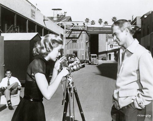 oldhllywoods's tweet photo. grace kelly and james stewart fooling around with their camera on the set of rear window (1954) https://t.co/tPH9bMgzjb