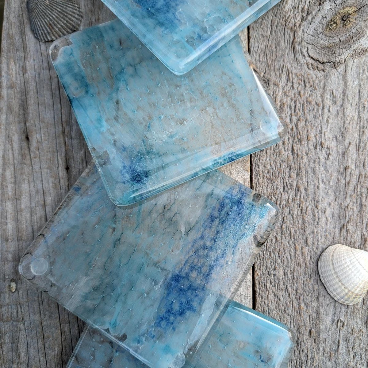 Samphireglass's tweet image. Beautiful 🌊 sea inspired fused glass coasters. Each one is unique with swirls and bubbles of blue, white and green colours. Perfect for the home. Available as single, two, four and eight piece sets. 

#handmade #giftideas #shopindie 

samphireglass.etsy.com/listing/1480...