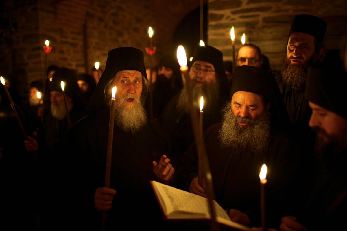 At night, when people in the world go to sleep, three thousand monks on Mount Athos wake up to begin their nightly prayer for the whole world. 

Every time you go to sleep, or while other people begin a different kind of wakefulness—going to bars or discos—the monks on Mount
