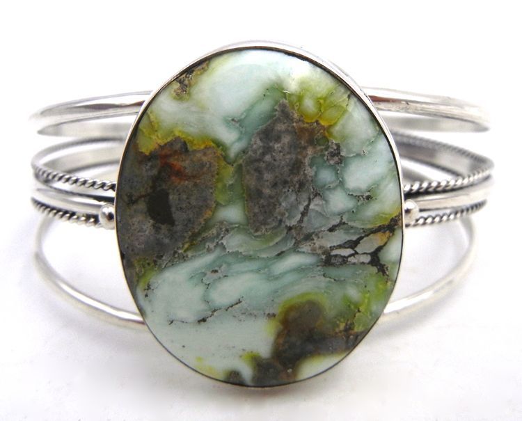 palmstrading's tweet image. Life, say the #Navajo, began when the first man and woman used a stone disk, edged with #turquoise, to create the sun. 

Cuff bracelet is Navajo made, artist unknown.