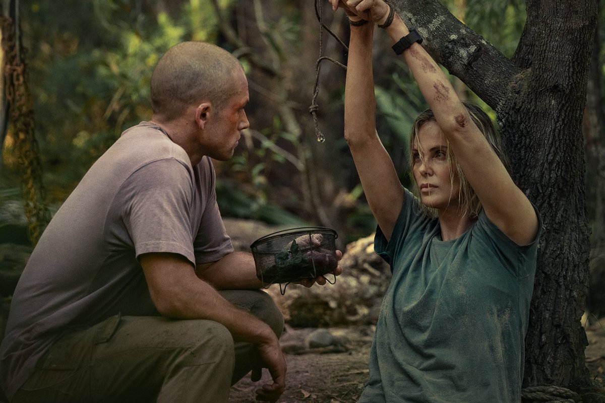 APlusReviews_'s tweet photo. #Apex has all the ingredients for a great survival thriller… but it never quite comes together. Despite a few effective action beats and strong use of its locations, the film never fully capitalizes on the tension of a survival showdown between Charlize Theron and Taron Egerton. https://t.co/oB55xSOPfD