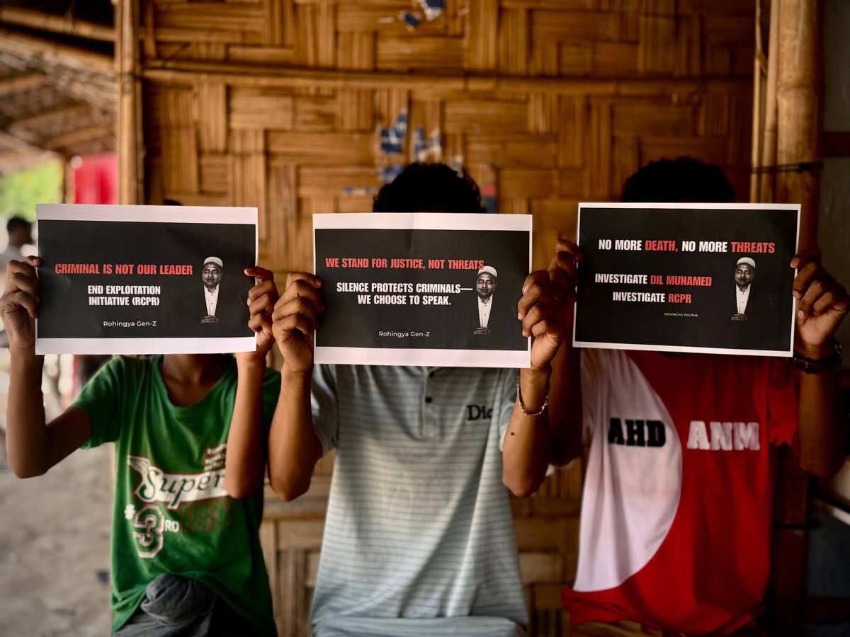 RoGenz46's tweet photo. (1/3) Rohingya Gen-Z and the wider community are becoming increasingly aware of the serious allegations linked to Dil Muhammad. In response, many—especially young people—are raising their voices peacefully and in an organized way, holding posters and demand justice. https://t.co/LrMg2QQyOo