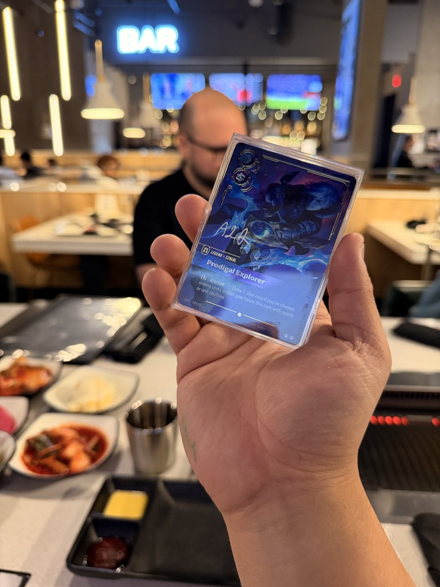 SummonersWkly's tweet photo. Btw we got @AlanzqTFT to sign the Ezreal stuff for giveaways!! 🥳🥳🥳 #riftbound ##RQatlanta https://t.co/uI5DQGsSm6