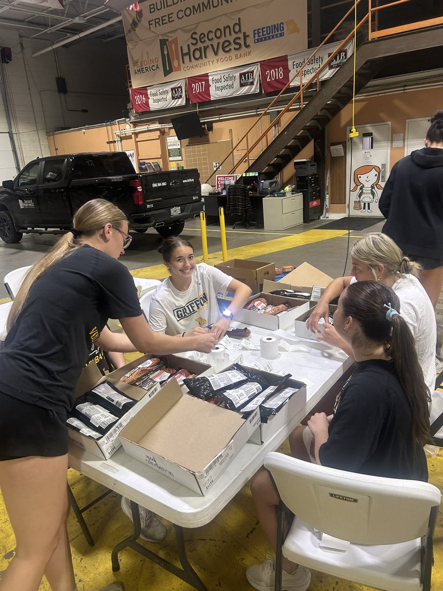 MWSUvolleyball's tweet photo. An afternoon spent with Second Harvest Food Bank helping package food for families in our community #GriffsGiveBack 💛 https://t.co/Gm2ldODj2v