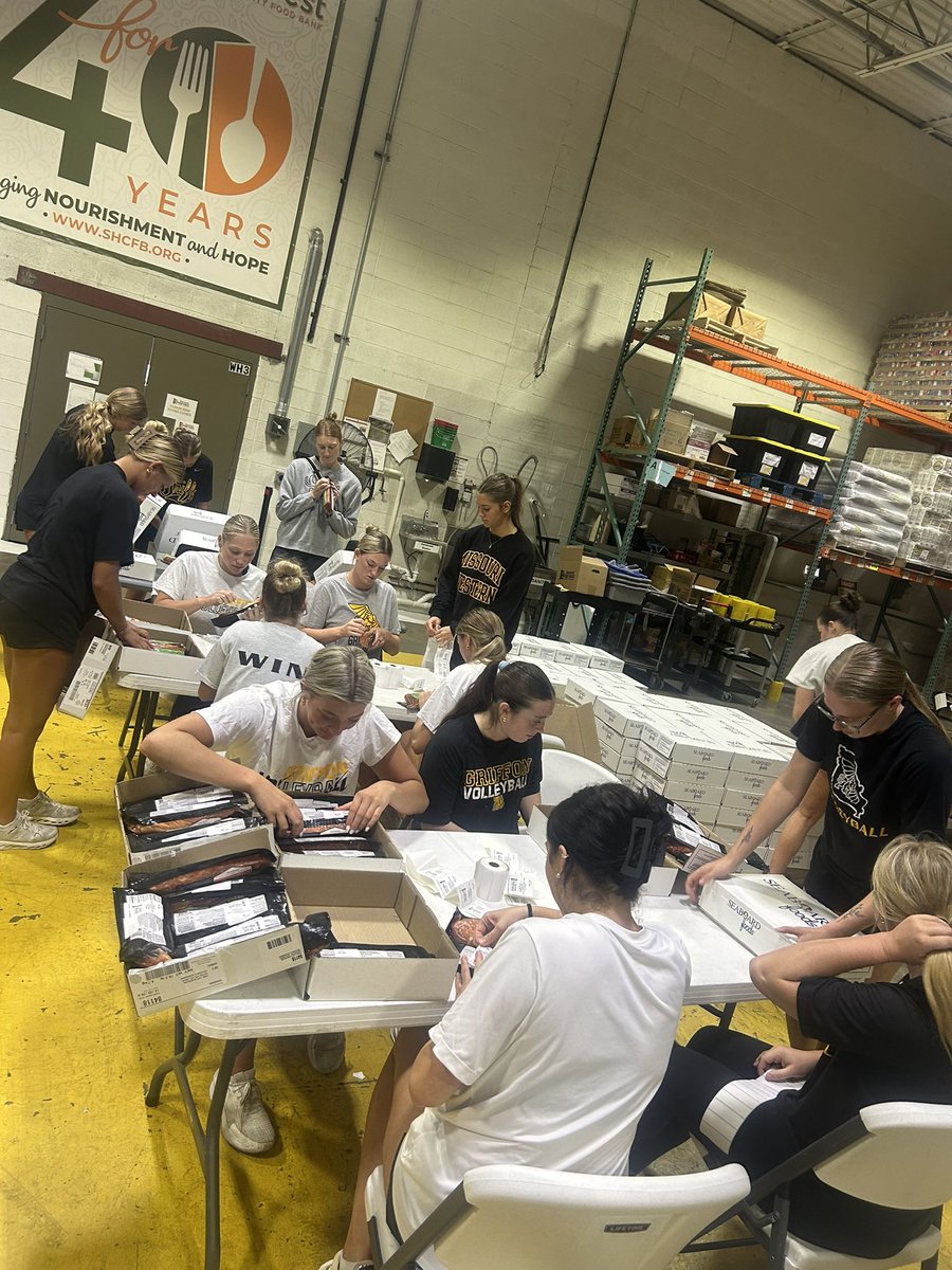 MWSUvolleyball's tweet photo. An afternoon spent with Second Harvest Food Bank helping package food for families in our community #GriffsGiveBack 💛 https://t.co/Gm2ldODj2v