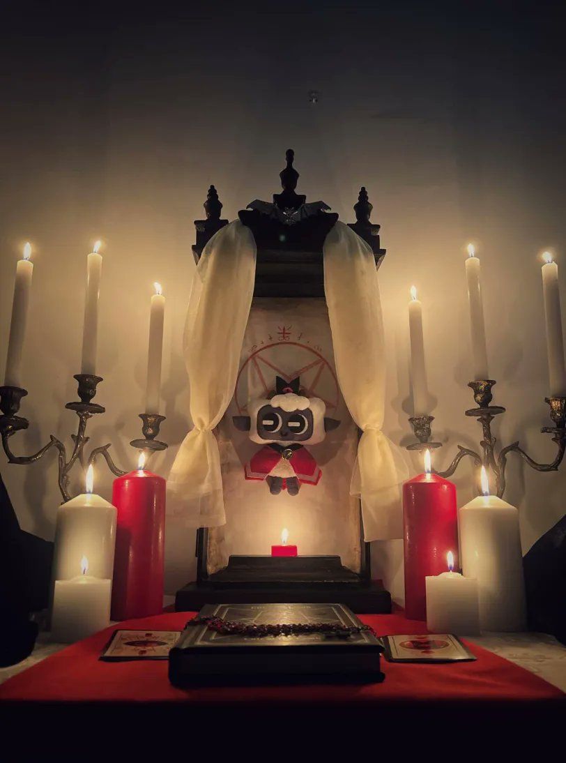 cultofthelamb's tweet photo. Lamb Plushie Shrine https://t.co/iWhsCqMGe2