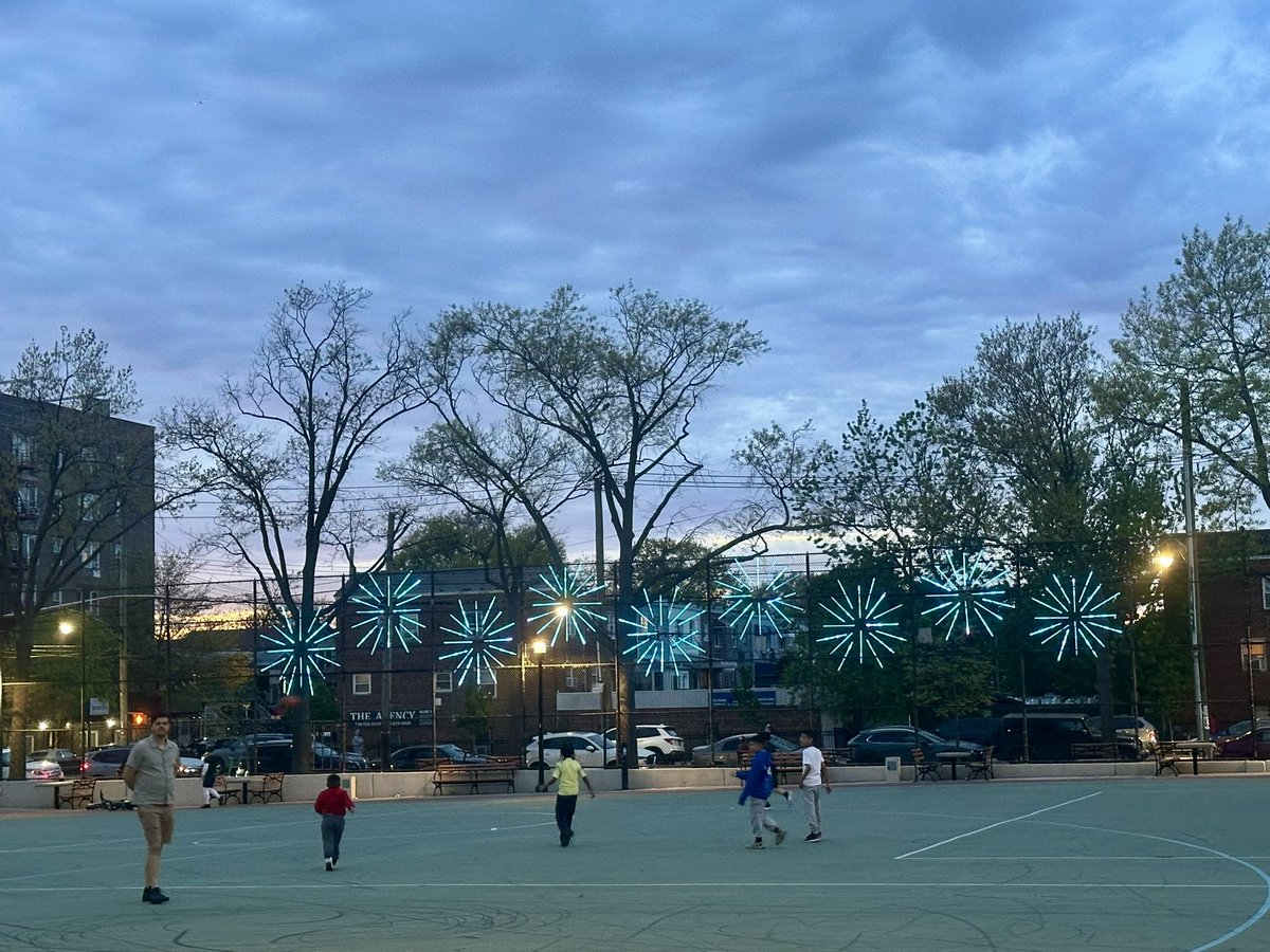 Morrisparkbid's tweet image. A beautiful April evening at Loreto Playground in the #Bronx, with children enjoying the space, running around and having fun! 

MPBID “#MorrisPark Stars” installation brightening the park - thanks @nycparks and @nycsmallbiz for the support! 
#publicart #lightingdesign