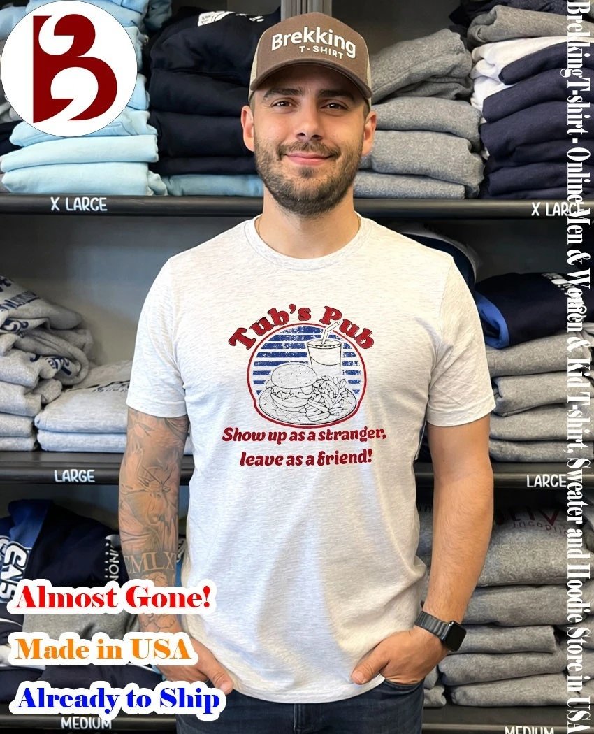 Brekkingtshirt's tweet image. 🍻🤝 More than a bar—this Tub’s Pub tee captures that welcoming spirit where strangers become friends in one unforgettable night.
 brekkingt-shirt.com/product/tubs-p…
#PubLife #GoodTimes #BrekkingTshirt #CommunityVibes #Cheers