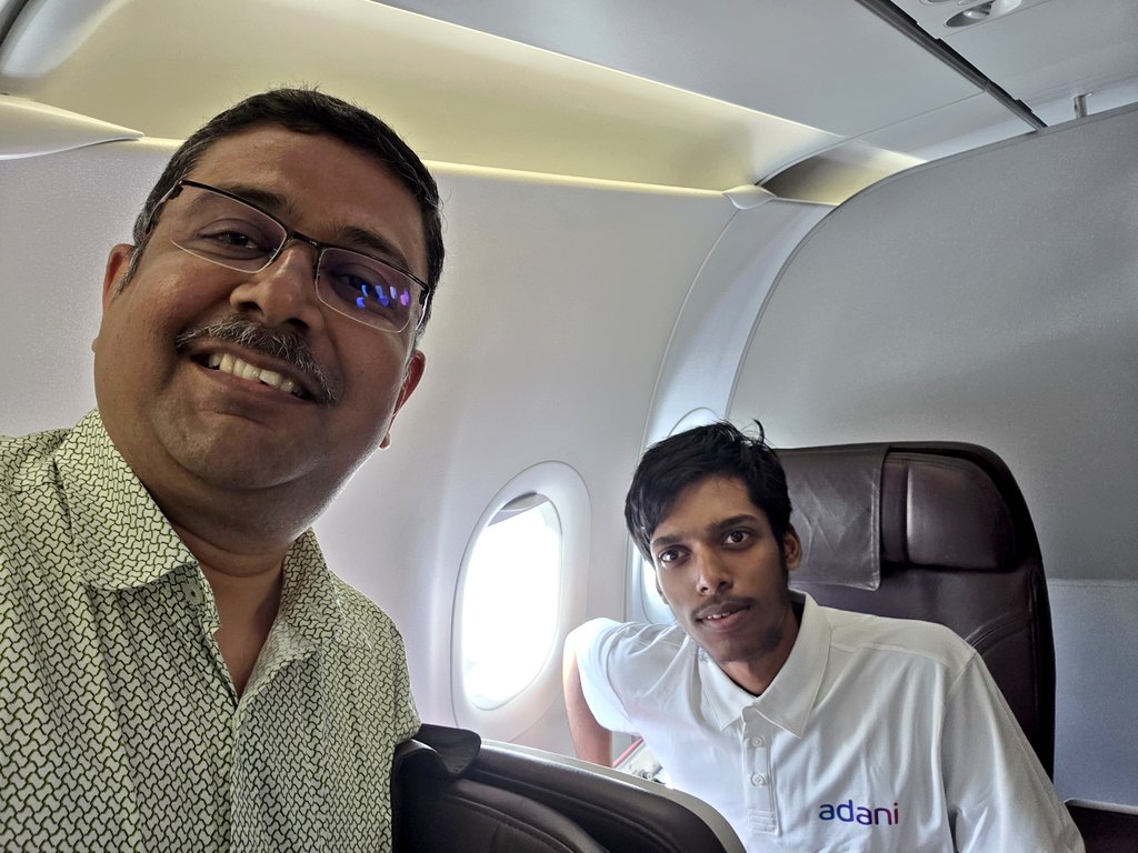 Ananth_IRAS's tweet image. Starstruck, for a moment, for my daughter! On the same flight with @rpraggnachess! #chess #flight