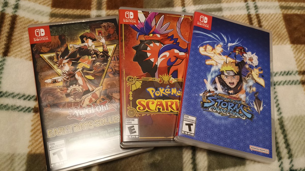 TheCalumity's tweet image. I had some Switch games show up today! I got Yu-Gi-Oh! Early Days mainly to play Destiny Board Traveler. Got Pokemon Scarlet since I've played through Violet already, and a Naruto fighting game! #Gaming #VideoGames #Switch #Nintendo #Anime