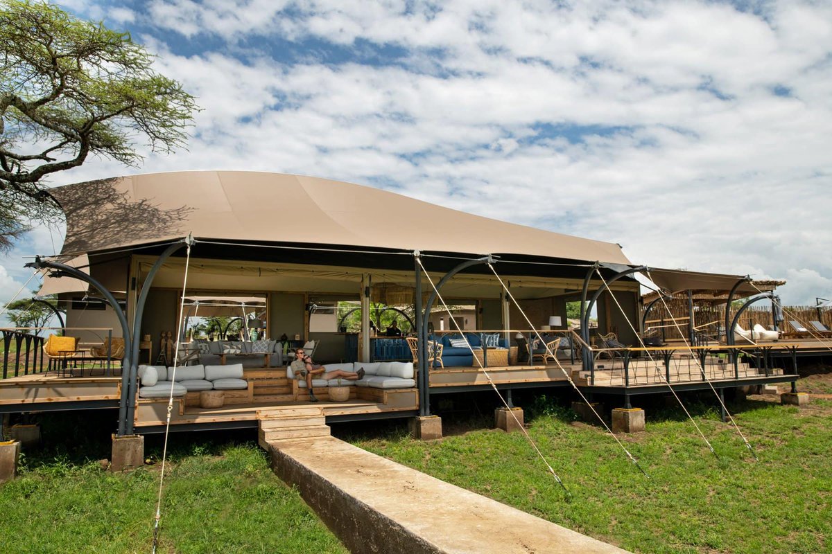 Kilimanjarounfo's tweet photo. Set in the heart of the Serengeti, this is where luxury slows down and nature takes over. Open spaces, beautiful design, and views that stretch endlessly into the savannah.

A place to relax, unwind, and truly experience the safari.

https://t.co/k4xHHfelg6 https://t.co/9THJNjQ7ap