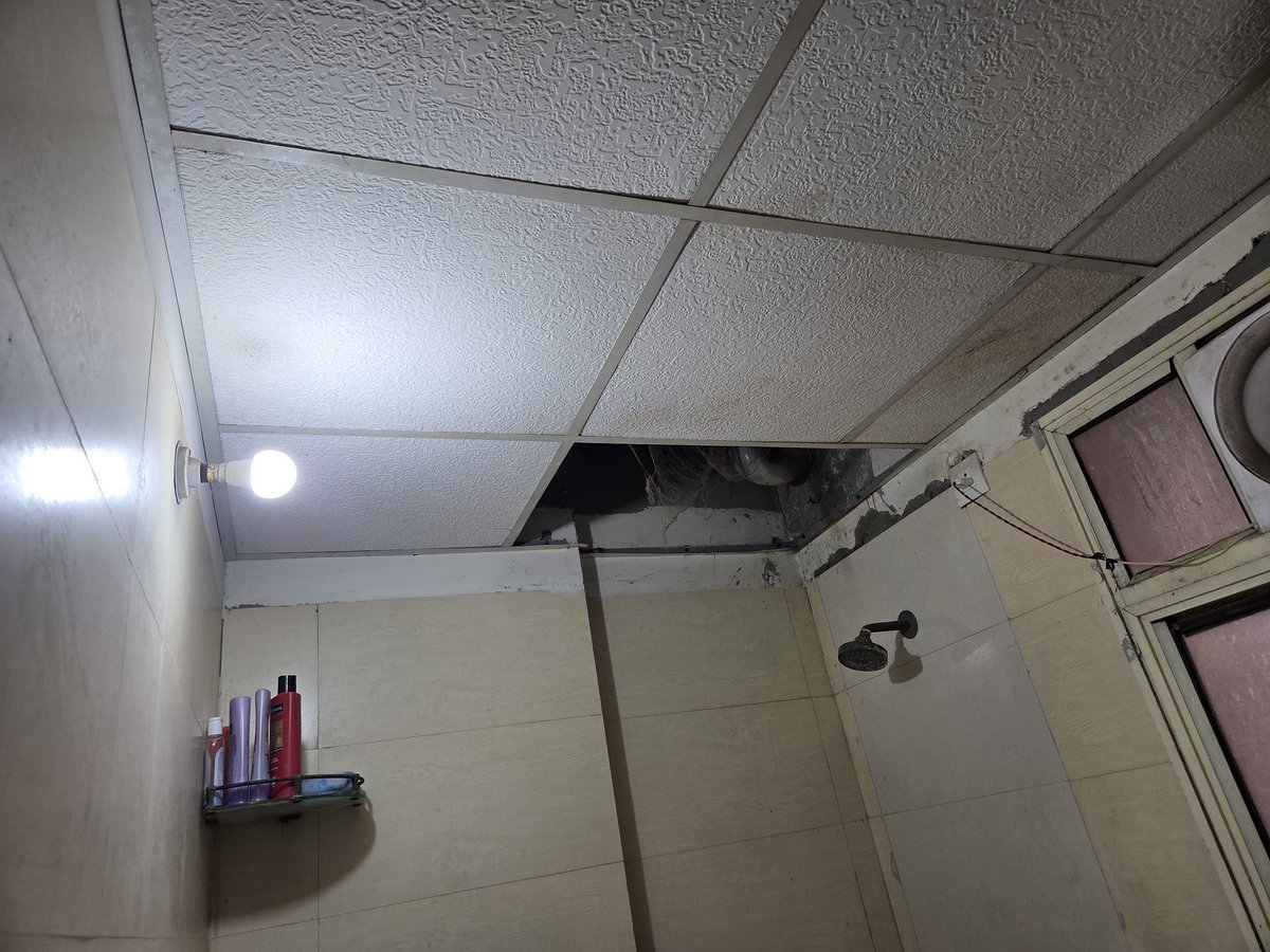 ParagTomar09's tweet photo. @AmrapaliSapphi2 @AmrpaliSapphire @AmrapaliSappP1 
These heavy tiles have been fallen out of nowhere from the washroom ceilings and now they don't even take the responsibility for this as this does not comes under their SOP, luckily no one was hurt but what if someone gets hurt? https://t.co/OyL5hUpDbE