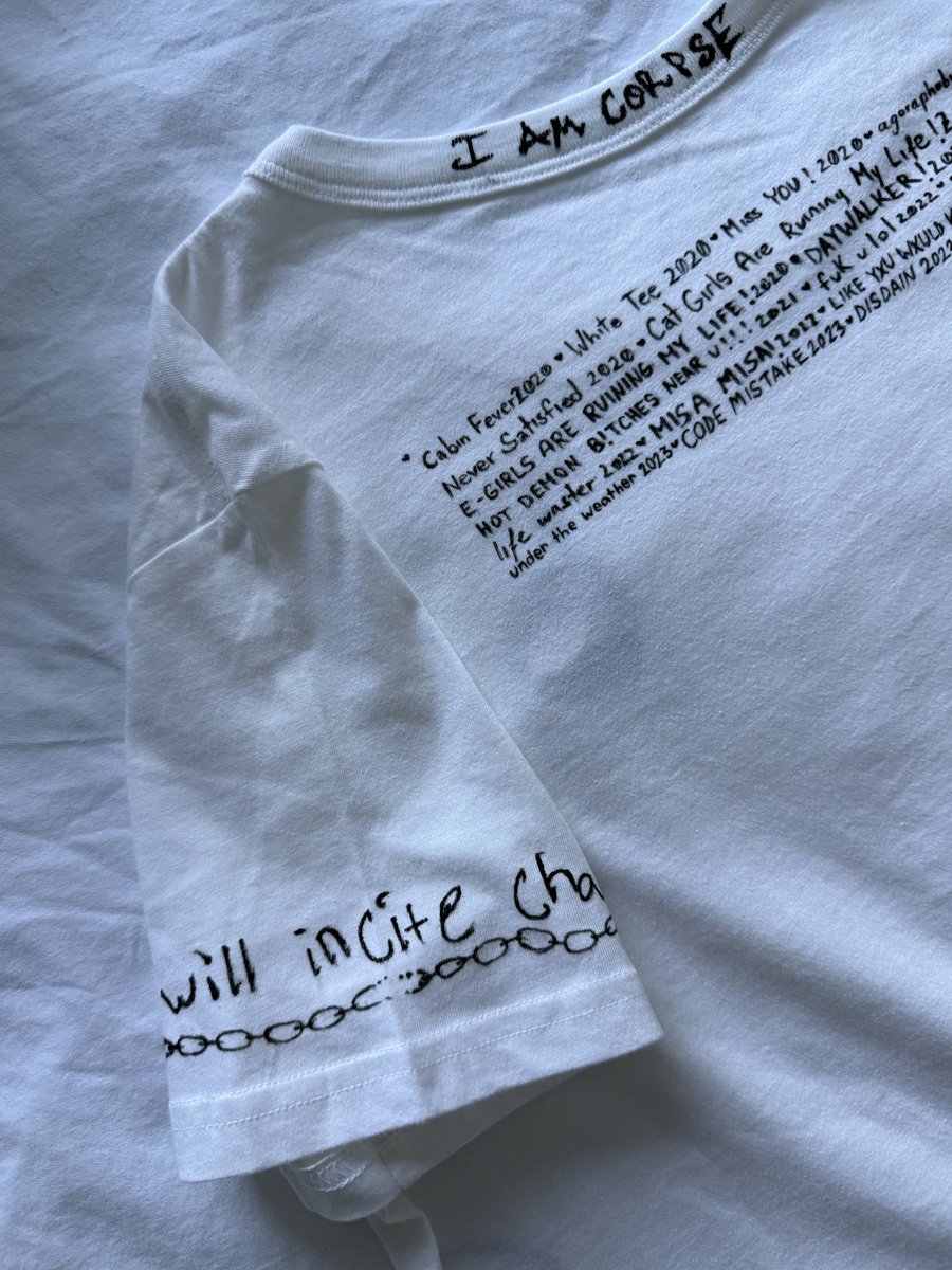 ThyMightyLord's tweet photo. In honor of corpsetwt community and corpse, here is the bag and shirt I made. 

Should I put a wine stain on my White Tee? ⛓️🖤 https://t.co/gnshmdmaJP