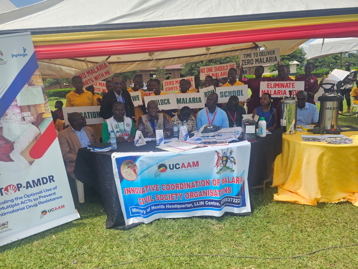 At the World Malaria Day celebrations in Bulamagi, Iganga, the Chief Guest of Honour Director General Olaro Charles visits and inspects the UCAAM exhibition stall alongside partners—Ministry of Health, Makerere University School of Public Health, and Jhpiego