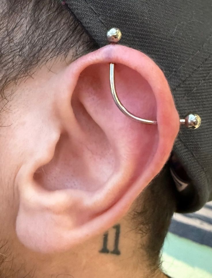 Custom bent industrial piercing performed by Luis Garcia at 12 oz. Studios Brooklawn, NJ. #12ozstudios #12ozpiercing #piercing